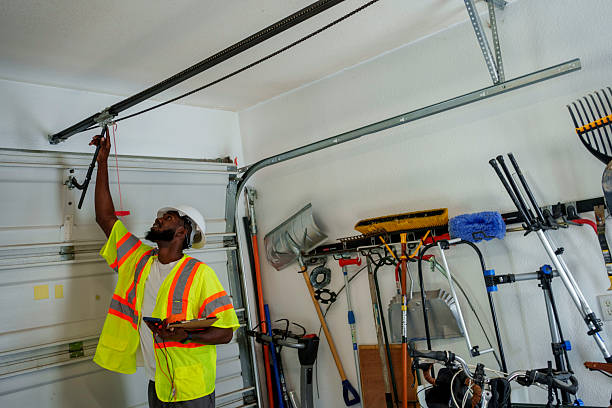Professional Garage Door Panel Replacement technician working in Nedrow, NY